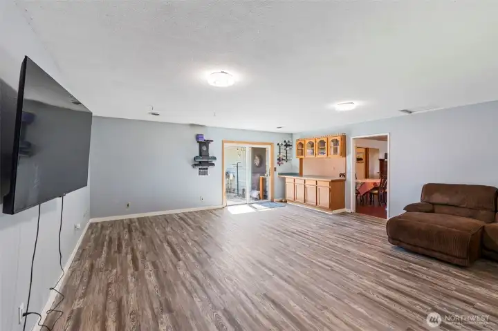 Large family room open to the back patio