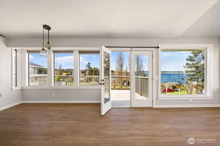 Open the french doors and expand your living space onto the deck. Wonderful views and sunny exposure.