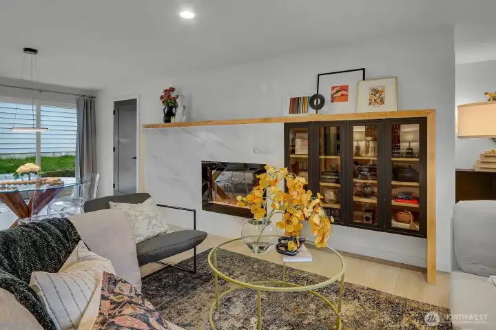 Living Room has Custom Built-ins & Fireplace