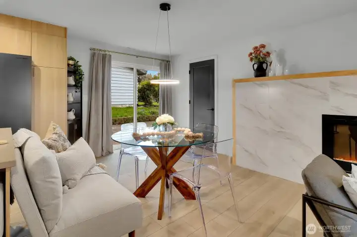 Dining Area has doors to back of home & half bath