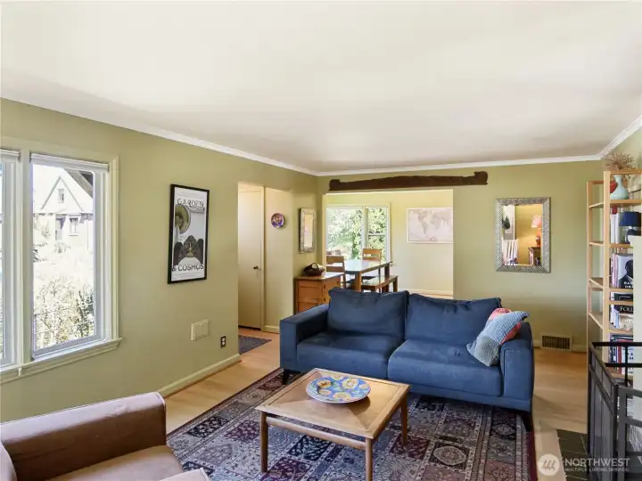Big picture windows & hardwood floors