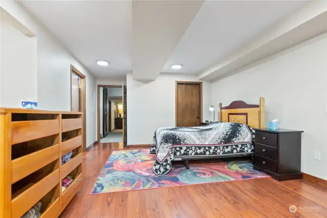 Suite connects to family room, bathroom, and bedroom(s) down hallway.