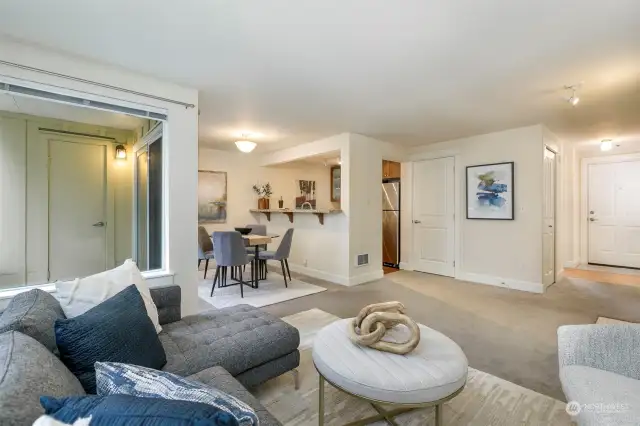 Open concept living and dining room.