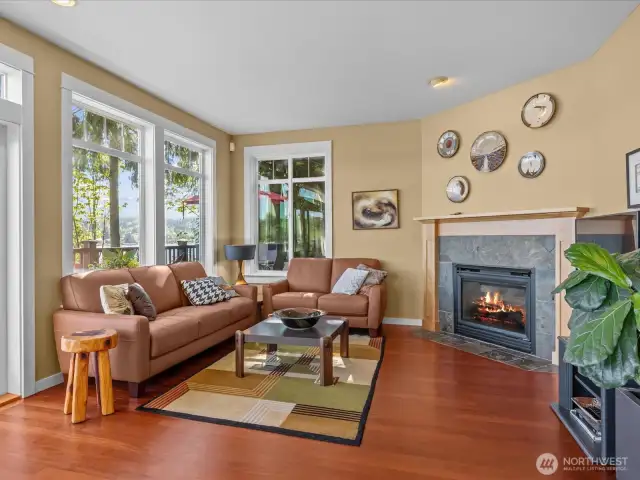 Cozy gas fireplace anchors the family room