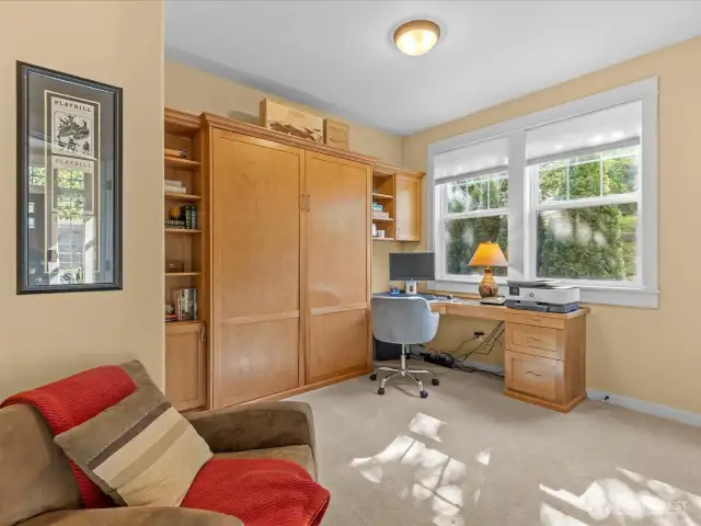 3rd bedroom has a built in Murphy bed and desk doubling the space as a guest too and office!