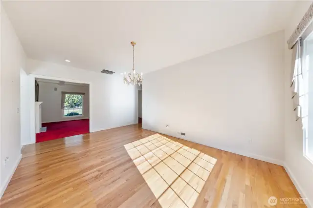 Formal dining opens to the living room