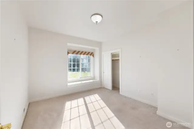 This is the other guest bedroom, also with a window seat