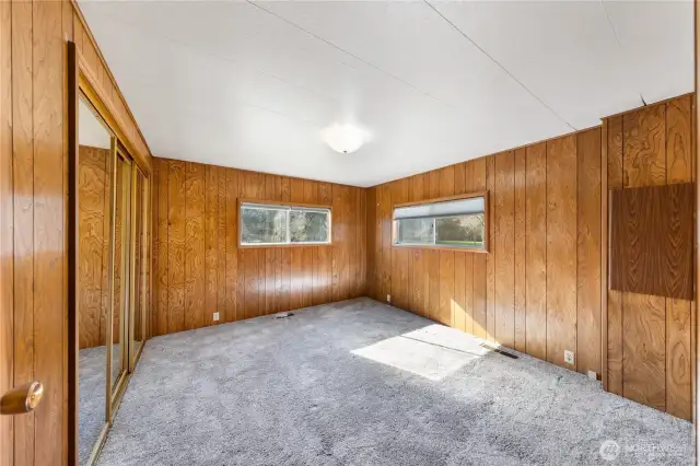 Primary bedroom.  It has a beautiful updated 3/4 bath w/ newer vanity & undermount sink