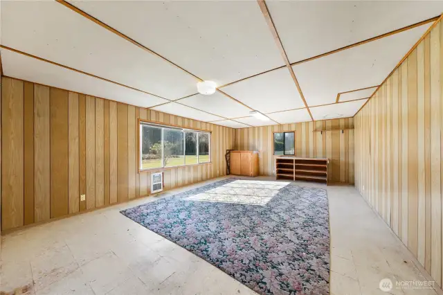 This large heated rec room used to be the pool table room.  It's behind the garage, accessed off the breezeway