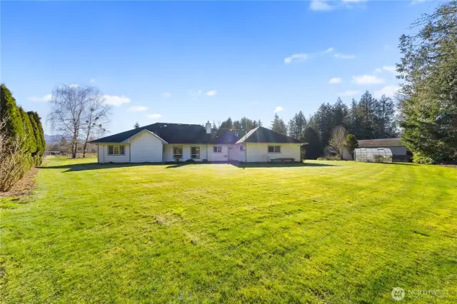 Back side of the main home.  Private patio area off the laundry/utility room