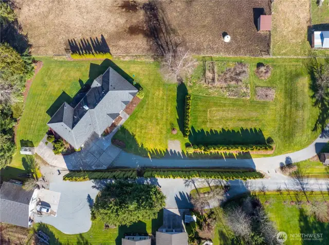 Aerial photo of the main home w/ it's own private driveway.  Individual septic systems for each home