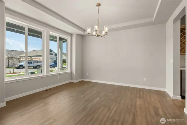 Formal dining.   Photos of a similar home, not actual, for illustration only.