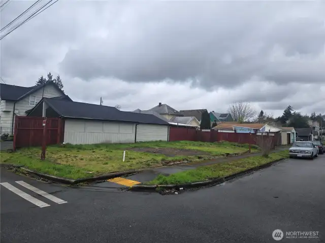 Level lot near transit is 68'x25' (1,718 sq ft) with all utilities in the street.