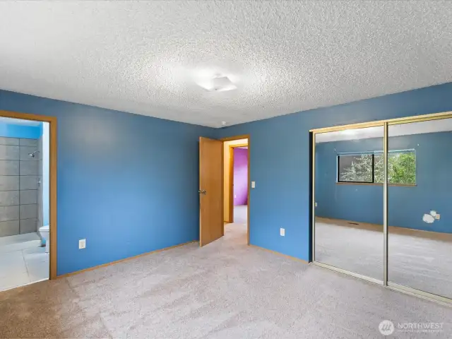 Primary w/ ensuite 3/4 bath.