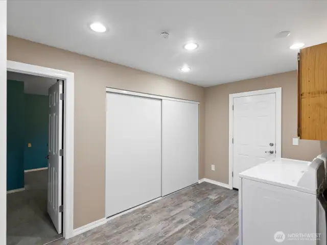 Large closet in laundry area.