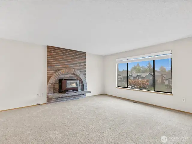 Wood insert. New carpet. Faux wood blinds throughout most of the rooms.