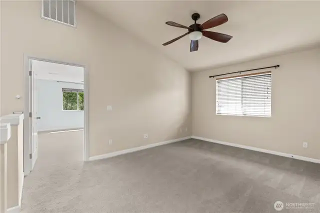 Upstairs extra loft space perfect for a second living area, an office, a play area, a reading nook....so may options! Primary bedroom through the door to the left.