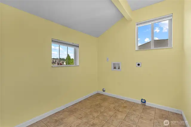 Convenient bright and sunny upstairs laundry