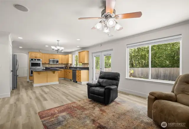 Open floor plan with second living and dining space