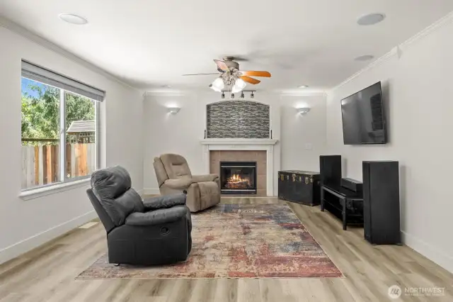 Cozy gas fireplace and recessed surround system in the second living room. Updated cordless blinds throughout the home.