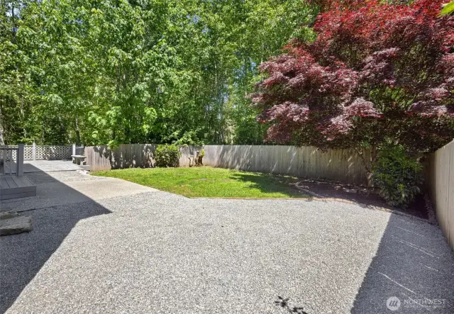 Private, fenced yard is bordered by NGPA on two sides. Updated with garden mix in front and back yards and pea gravel with weed barrier for easy maintenance. Large patio and deck with gas line stub at the back of the house, ready for a gas grill.