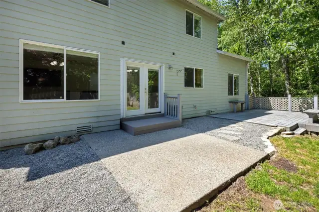 Private, fenced yard is bordered by NGPA on two sides. Large patio and deck with gas line stub at the back of the house, ready for a gas grill.