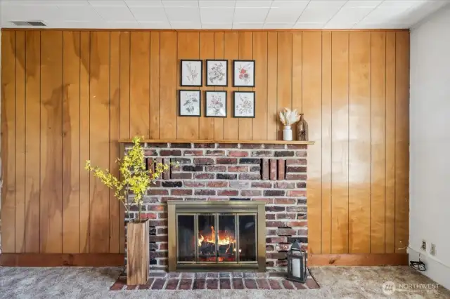 Cozy wood fire with brick detail