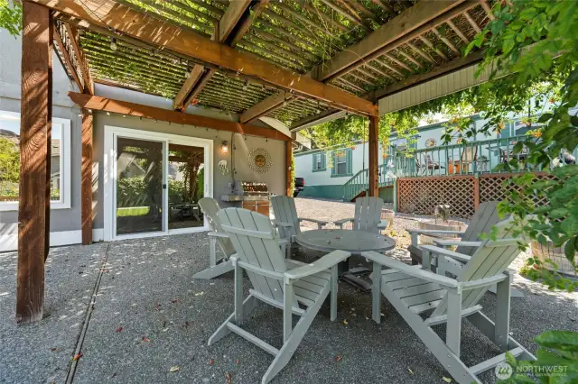 When the grill is going and friends are near—this shady vine-covered patio gazebo is made for summer celebrations, dinner al-fresco, and sunset drinks