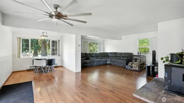 Open layout featuring engineered hardwood floors through the main floor.