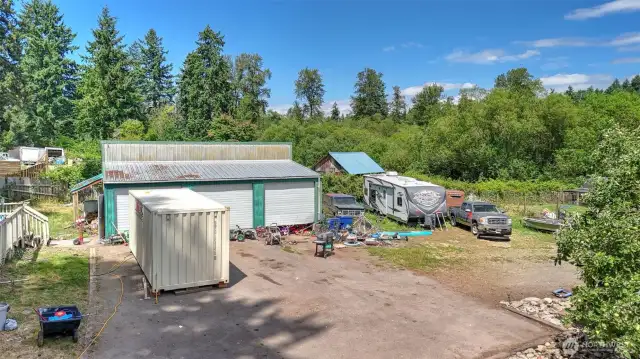 Huge detached 3-car garage is great for additional storage and workspace.