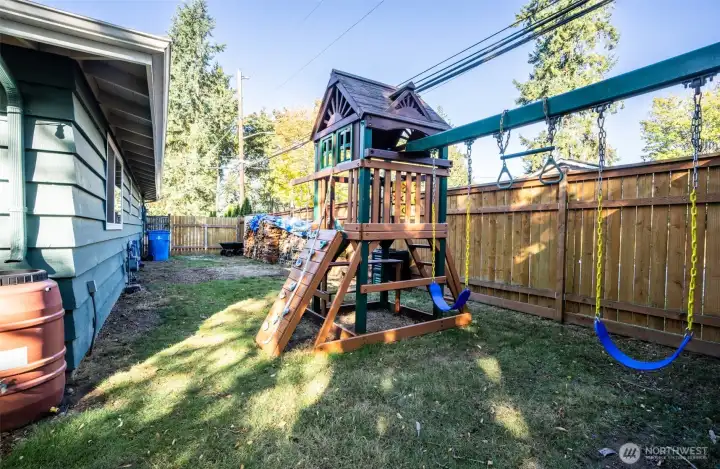 Enjoy extra RV parking next to the playset.