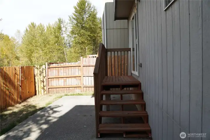 Cozy backyard with lots of potential.