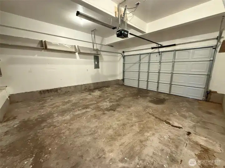 Large garage with plenty of storage space.