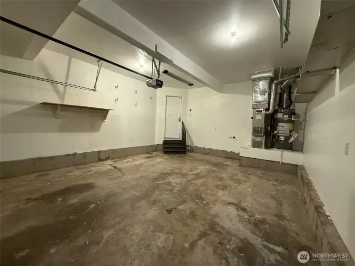 Large garage with plenty of storage space.
