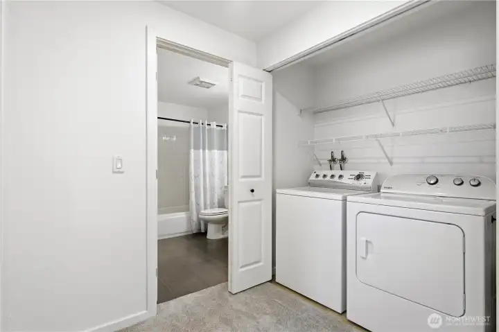 In-unit washer and dryer set neatly located in the closet.