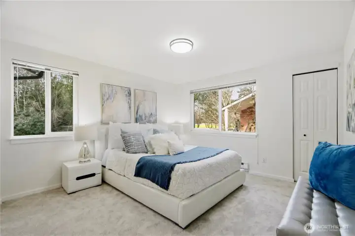 Spacious primary bedroom with great natural light