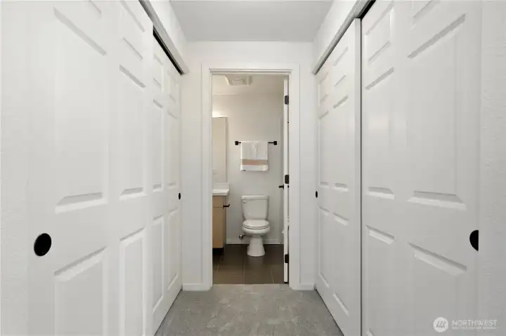 Primary bedroom featuring dual closets for ample storage.