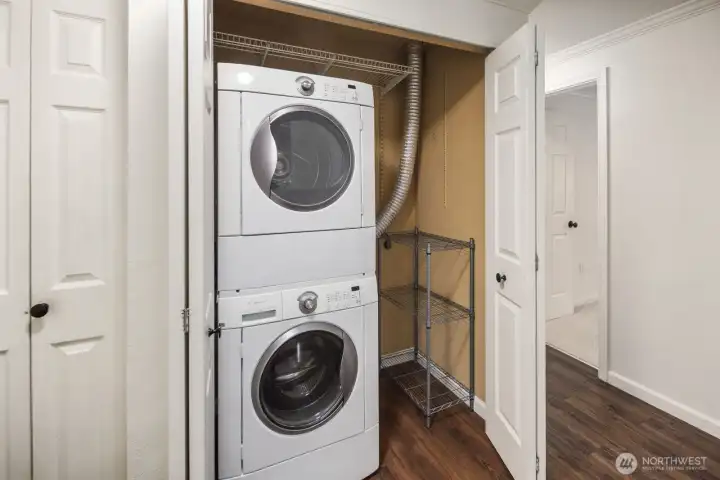 In-unit laundry stays. Coat closet to the left.