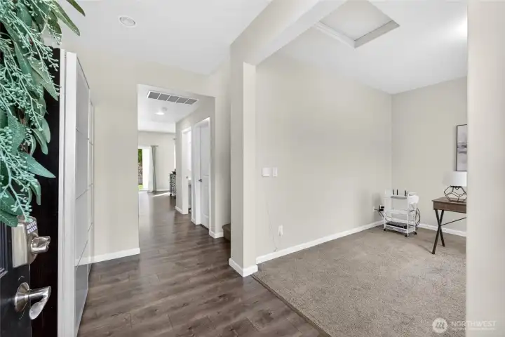 From front door to spacious foyer