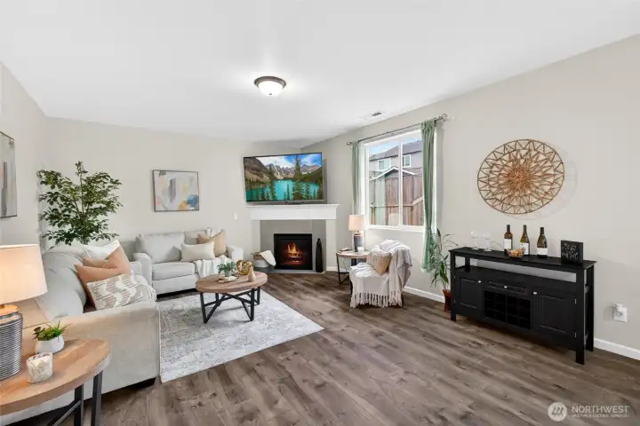 Living room with gas fireplace. NOTE: is a Virtual Fire in fireplace.