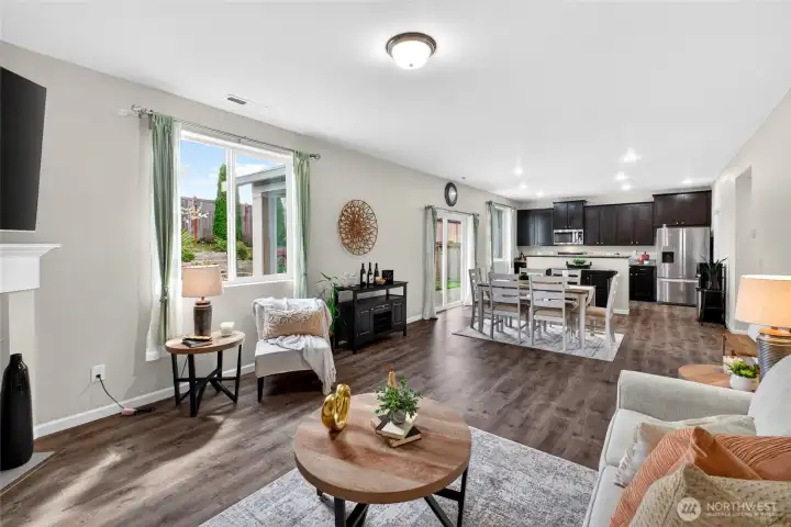 Open concept kitchen, dinning & living areas