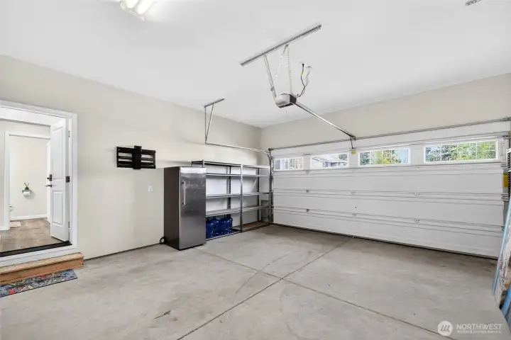 2 Car Garage with refrigerator & shelves