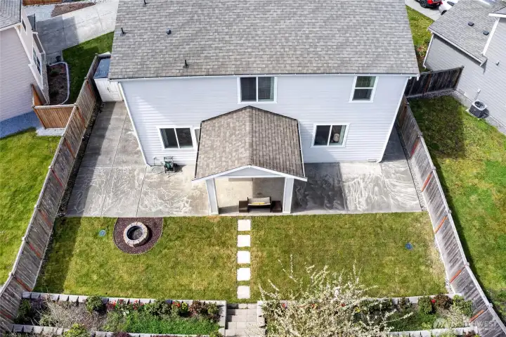 Enjoy a firepit while lounging in the backyard