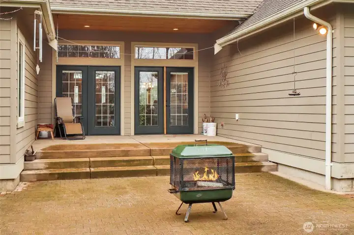 Amazing partially covered patio space, gives enough cover to grill while still letting in natural light.