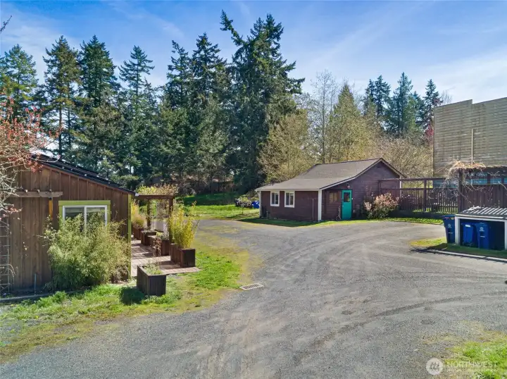 The converted garage that is currently used as a message / office. 3/4 bath sliders on the backside.