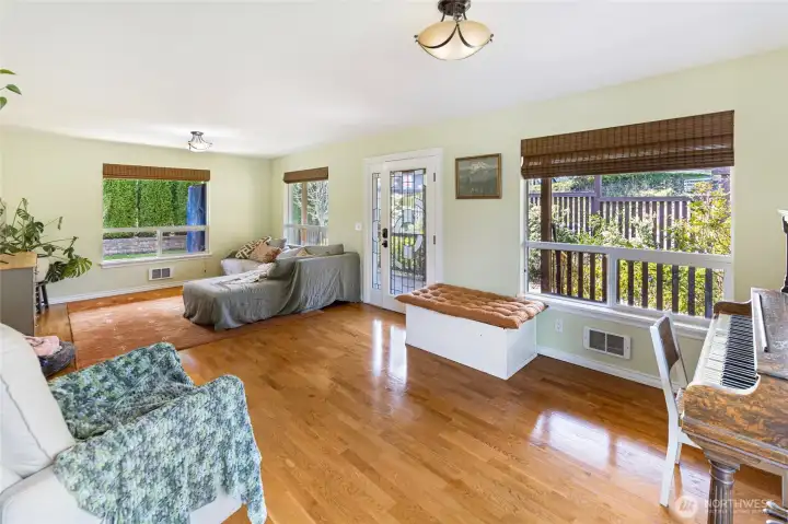 The living room & front door to the covered porch.