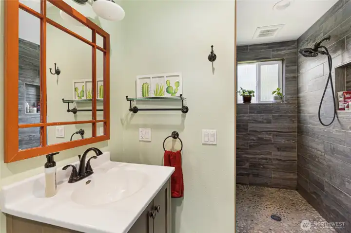 Guest 3/4th bath with heated tile flooring.