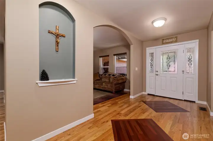 Front entry with hardwood floors.
