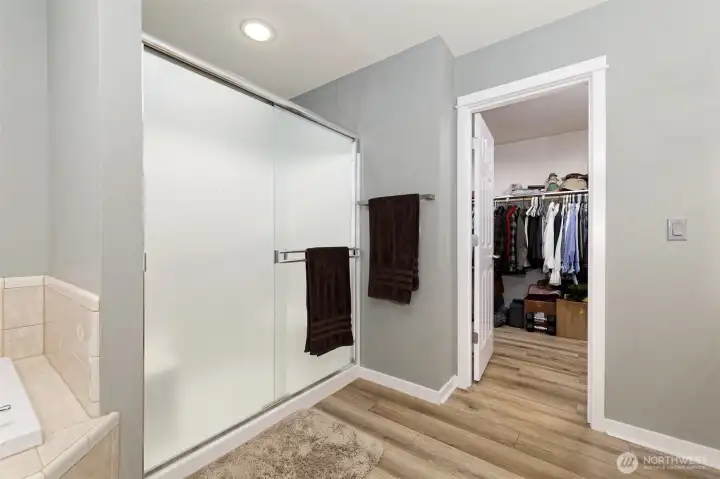 Main bathroom shower with closet.