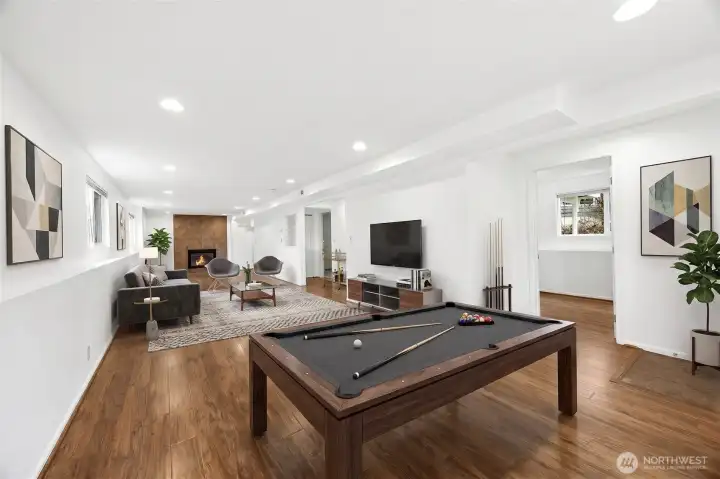 Large bonus room with hardwood floors and open layout—ideal for a home office, gym, media room, or creative workspace.”